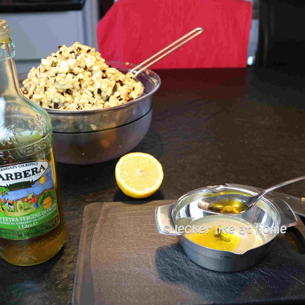 Olivenoel-und-Zitrone-vermengen
